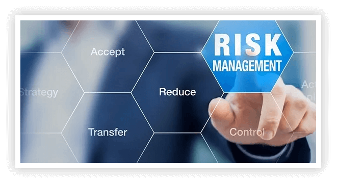 A person is touching the words risk management.